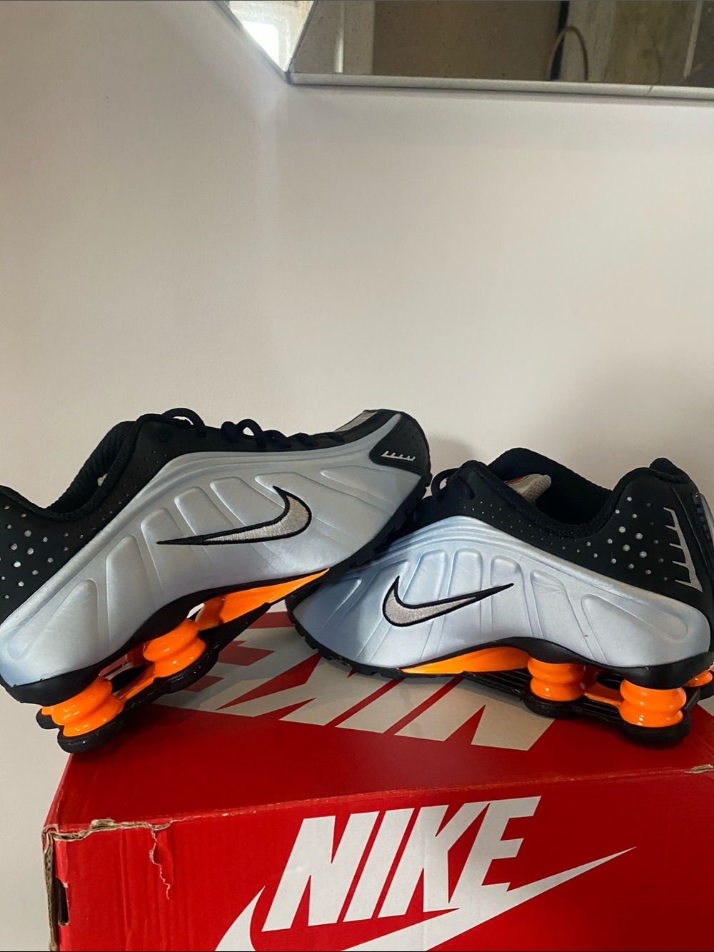 Nike Men’s Black & Silver nike shocks with orange details